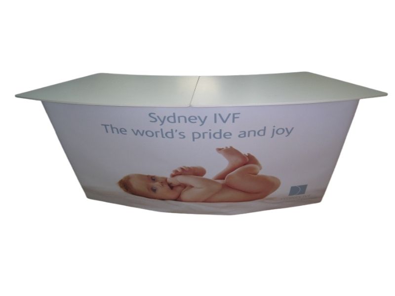 Two tables side-by-side to create larger, curved work surface