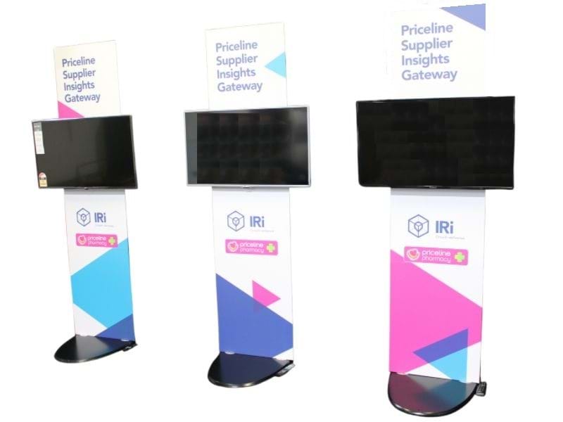 TV 2 Go stands with 43" TVs and custom printed backing panels