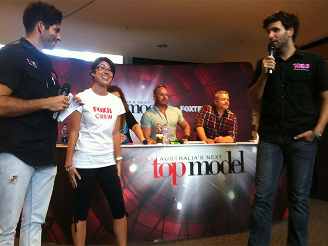 Superwall Backdrop with Custom Dem Tables in Front