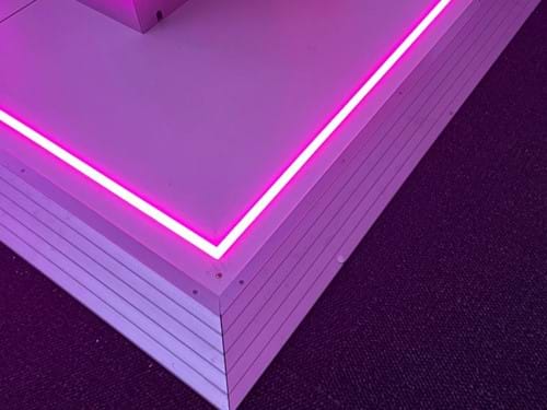 Perimeter lighting added to a raised floor