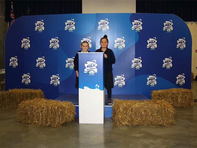 Country themed Display; plinth, branded wall and hay bales