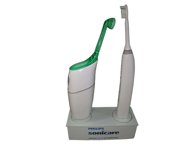 Giant toothbrushes on turntables