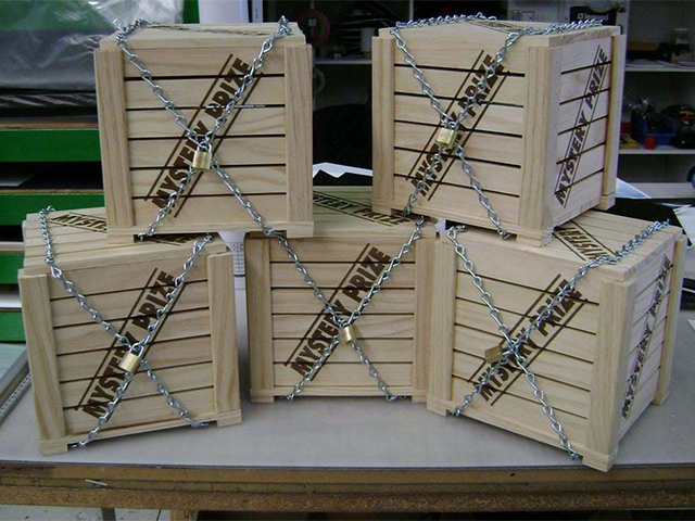 Custom timber crates with chain and padlock
